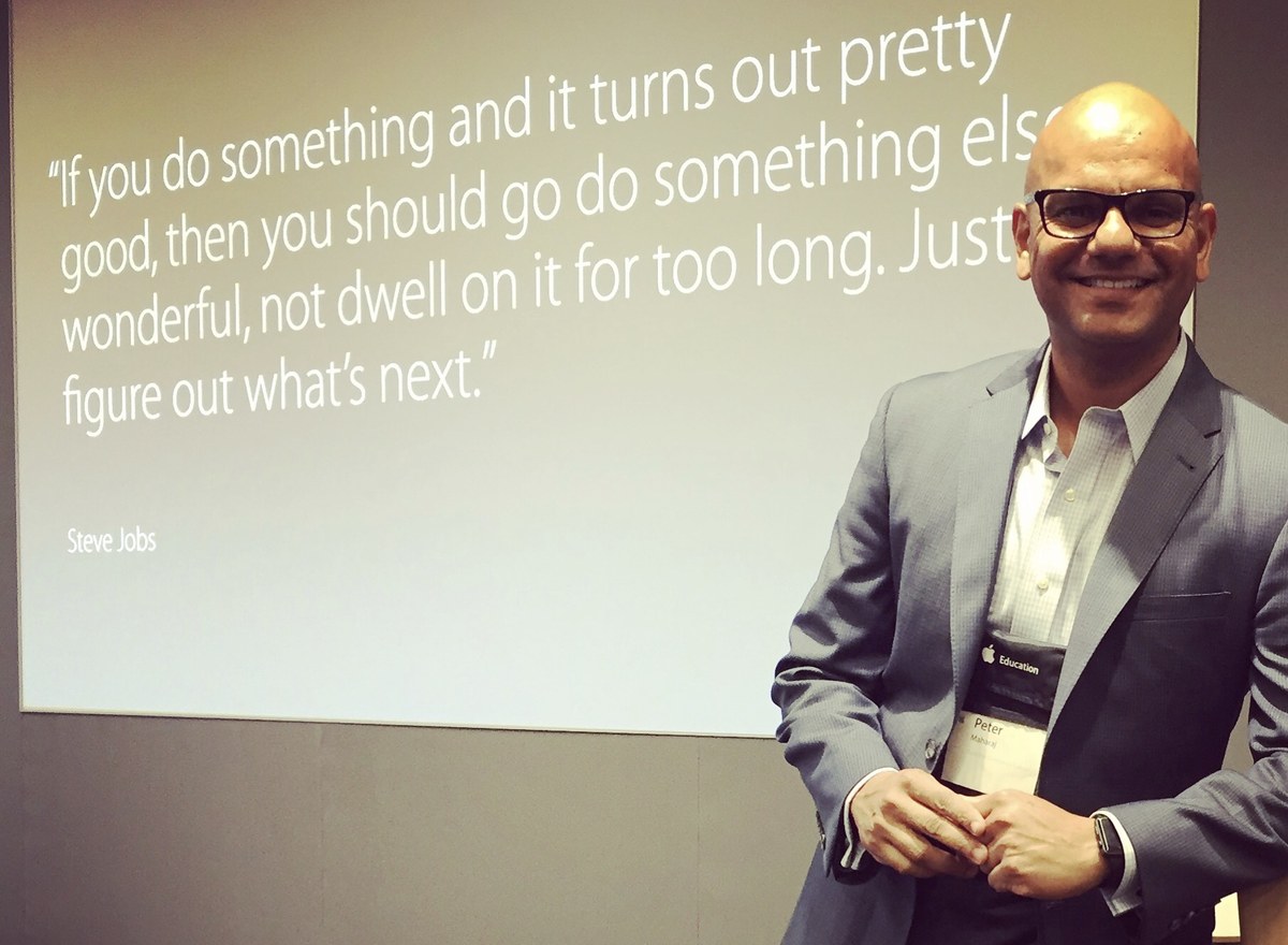 Peter at an Apple Education event beside a quote about what comes next